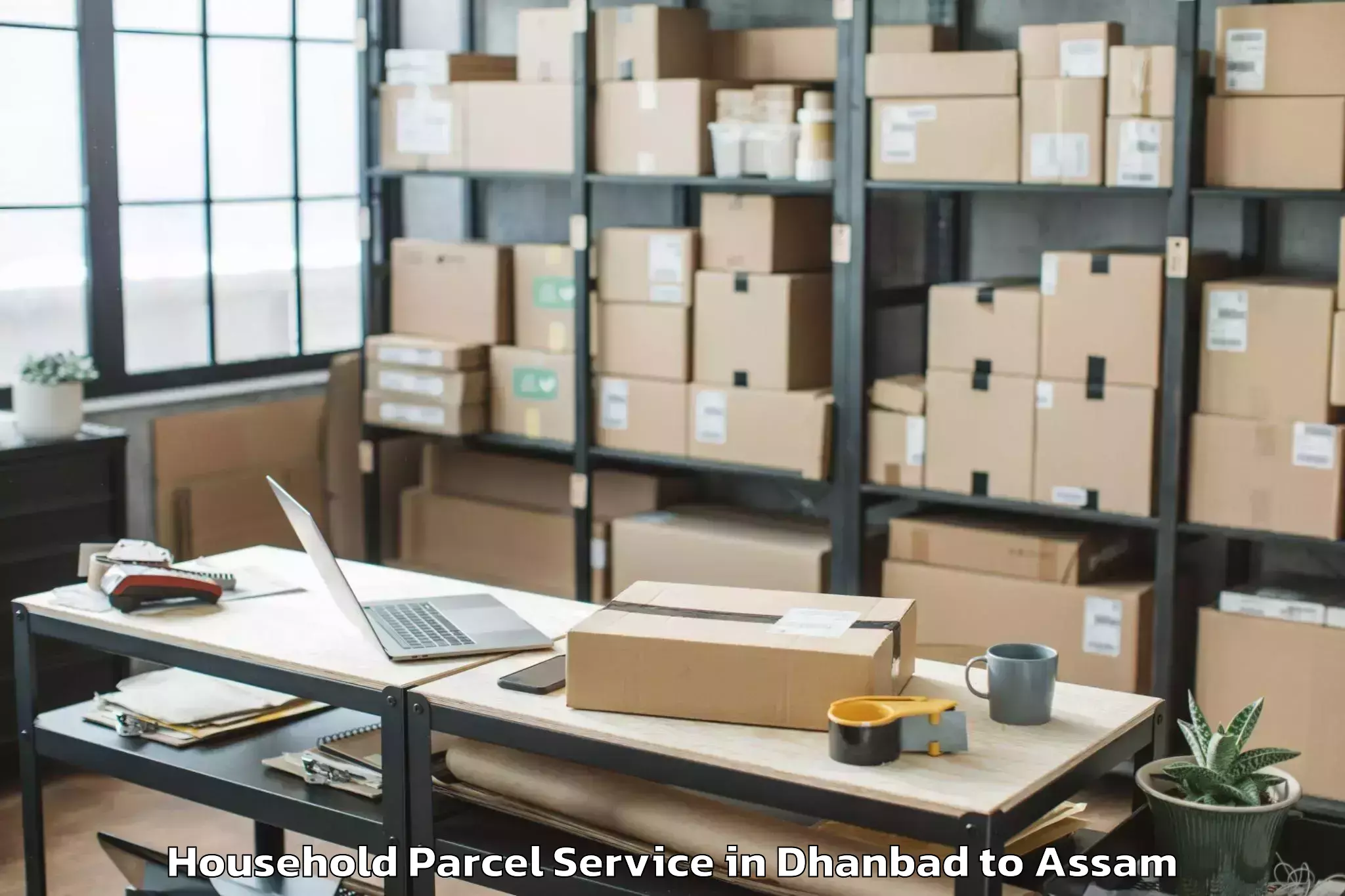 Book Your Dhanbad to Guwahati Airport Gau Household Parcel Today